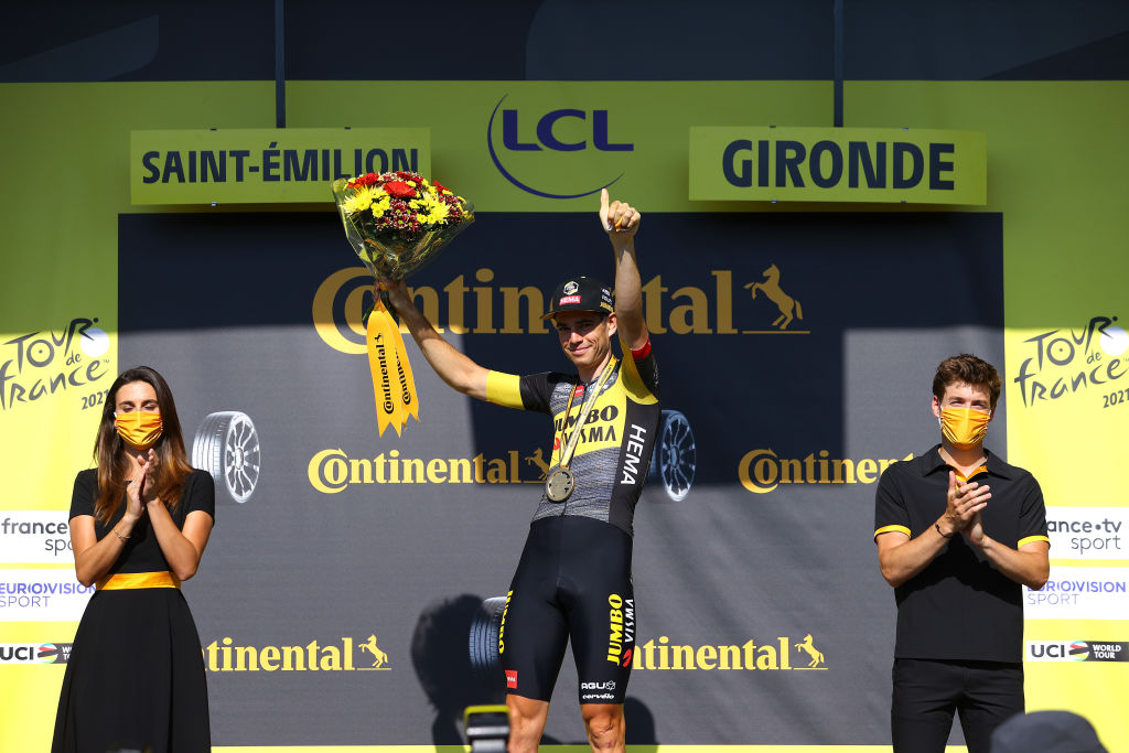 SAINTEMILION FRANCE JULY 17 Wout Van Aert of Belgium and Team JumboVisma stage winner celebrates at podium during the 108th Tour de France 2021 Stage 20 a 308km Individual Time Trial Stage from Libourne to SaintEmilion 75m ITT LeTour TDF2021 on July 17 2021 in SaintEmilion France Photo by Tim de WaeleGetty Images