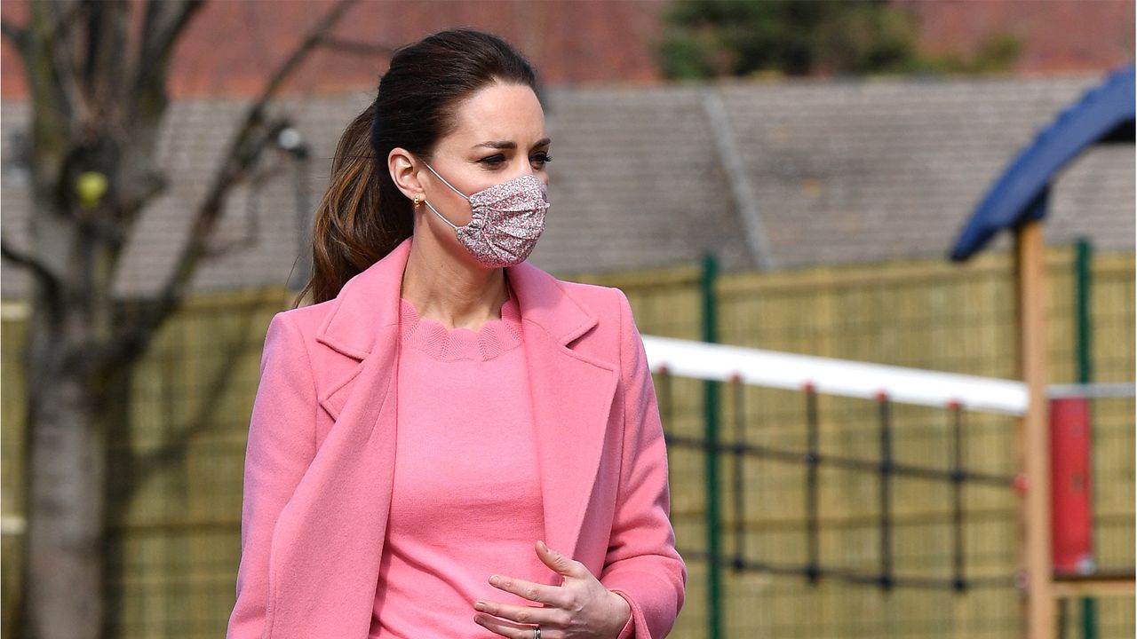 Britain&#039;s Catherine, Duchess of Cambridge gestures during a visit to School21 following its re-opening after the easing of coronavirus lockdown restrictions in east London on March 11, 2021. - The visit coincides with the roll-out of Mentally Healthy Schools resources for secondary schools and how this is helping put mental health at the heart of their schools curriculum. (Photo by JUSTIN TALLIS / various sources / AFP) (Photo by JUSTIN TALLIS/AFP via Getty Images)