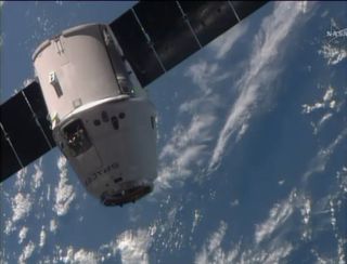 A SpaceX Dragon space capsule nears the International Space Station on April 20, 2014 to delivery nearly 5,000 lbs. of supplies and cargo for NASA.