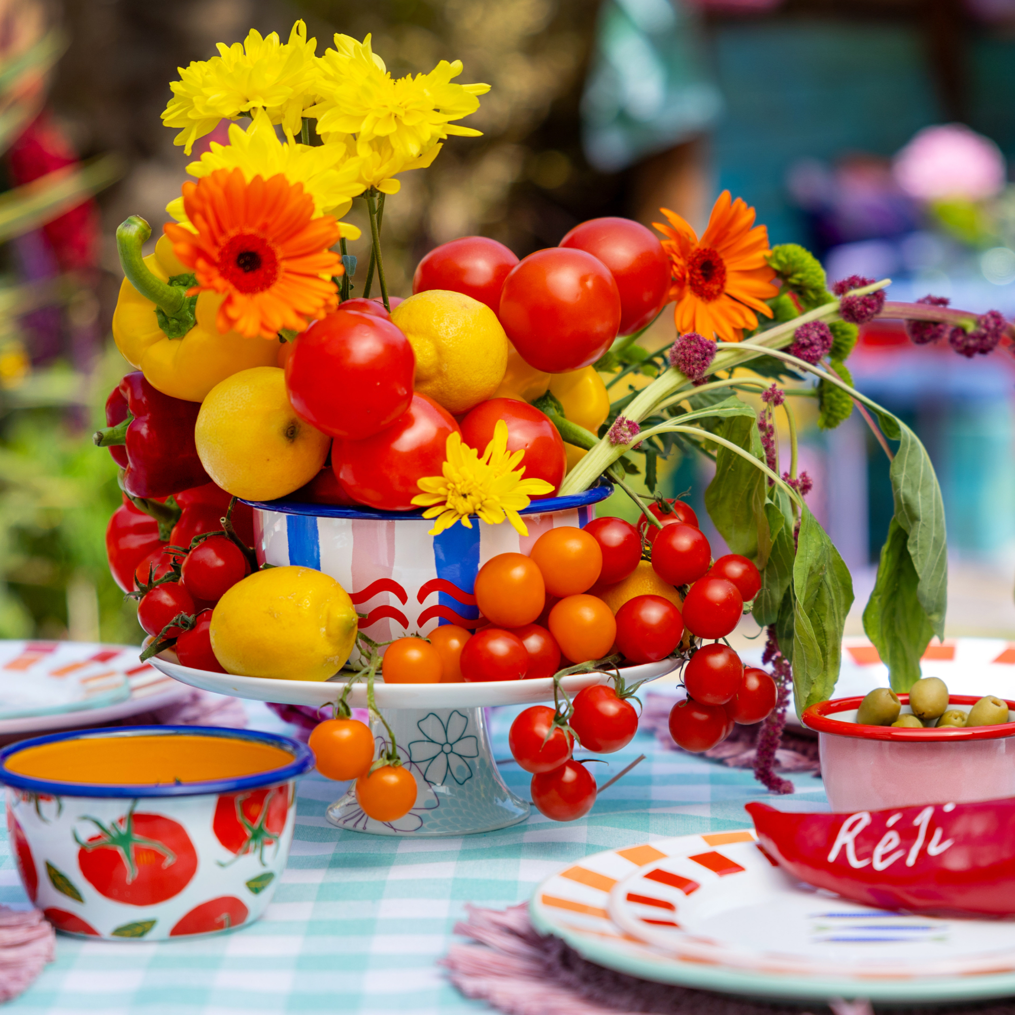 table centrepiece made w with lemons, peppers and tomatoes