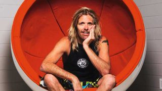 Taylor Hawkins sitting in a 60s chair