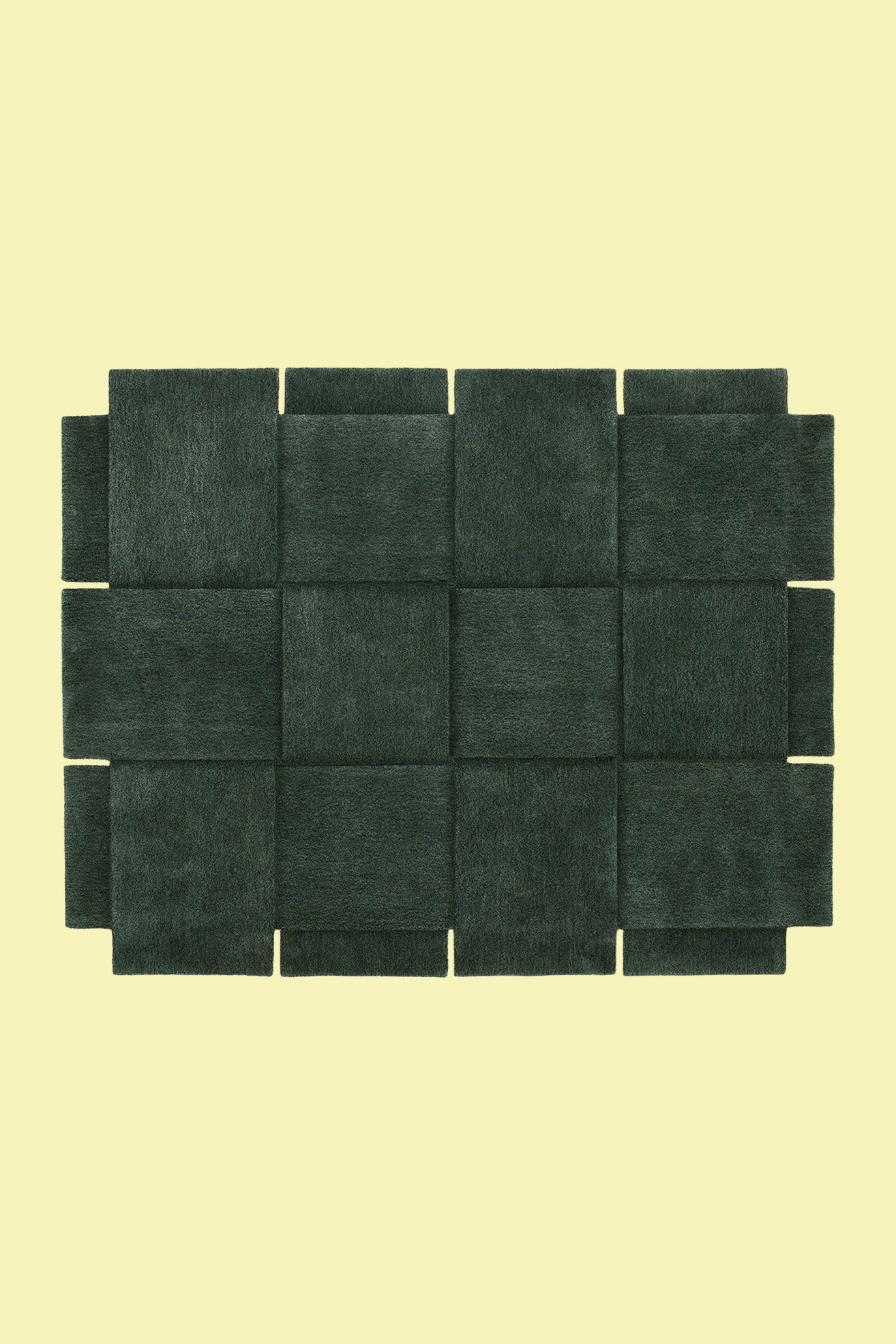 A woven-style dark green rug