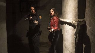 Kaya Scodelario as Claire Redfield and Avan Jogia as Leon Kennedy in Resident Evil Welcome to Raccoon City