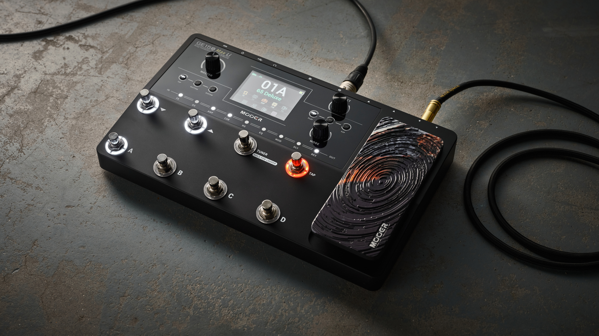 A Mooer GE150 Max Li multi-effects pedal on a concrete floor