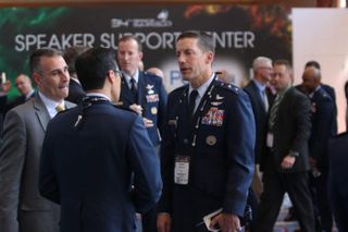 U.S. Air Force Maj. Gen. Robert Skinner, right, speaks with attendees of last year's Space Symposium.