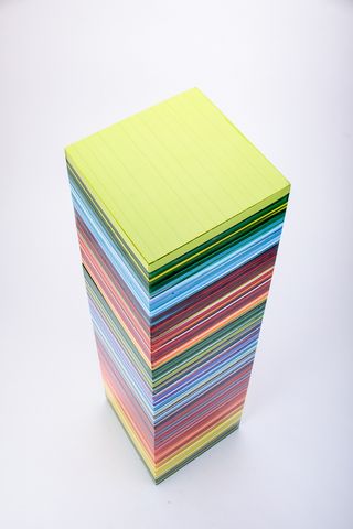 A stack of colourful glass squares