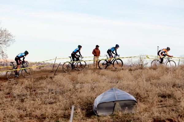 Riders make there way up from the lake shore.