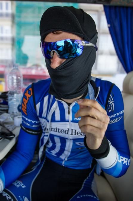 Chris Jones (UnitedHealthcare) decides what to bundle up with before another cold ride.
