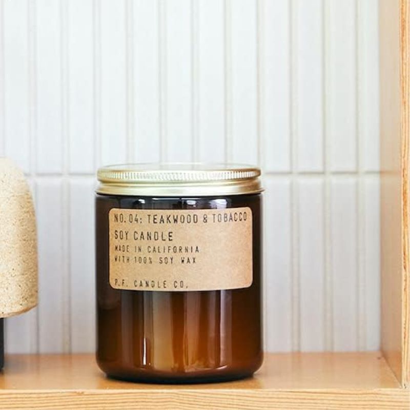 P.F. Candle Co. Teakwood & Tobacco Candle is one of the best candles on Amazon for the kitchen.