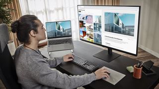 A man using the Samsung ViewFinity S8 (S80UD) for design work