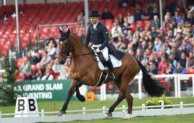 Ben Hobday was wearing ribbons in memory of rider Izzy Squire as he rode Mulrys Error GBR during the Dressage phase of The Mitsubishi Motors Badminton Horse Trials at Badminton in Gloucestershire, UK on 4th May 2016