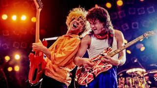 Rock musicians Sammy Hagar and Eddie Van Halen (1955 - 2020), both of the group Van Halen, performs onstage at the Rosemont Horizon, Rosemont, Illinois, March 15, 1986. 