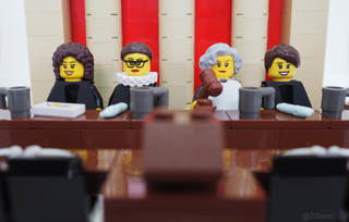 Lego figures in a court