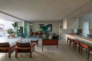 The third-floor dining room, kitchen and lounge by Inês Lobo and Paolo Mendes da Rocha