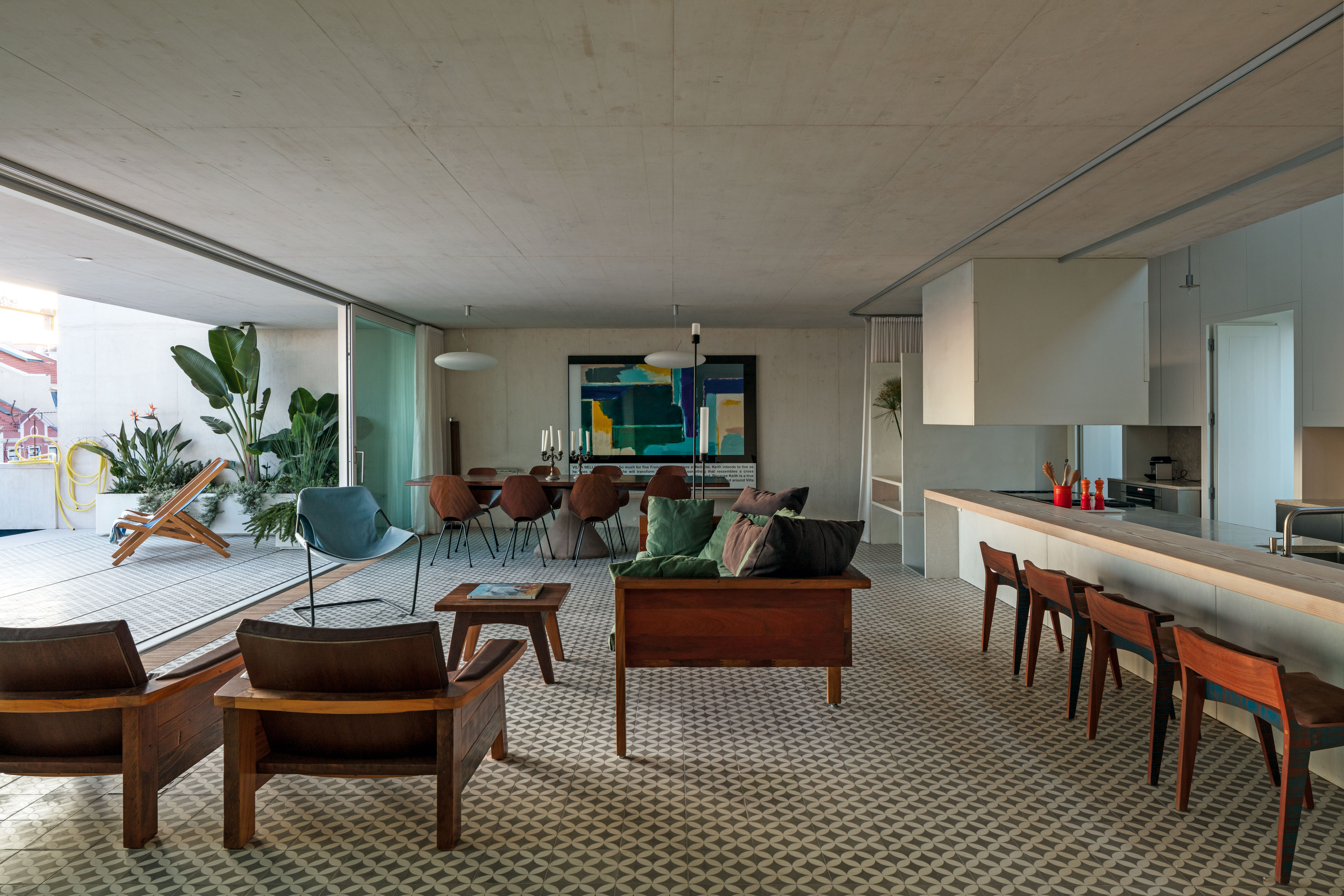 The third-floor dining room, kitchen and lounge by Inês Lobo and Paolo Mendes da Rocha