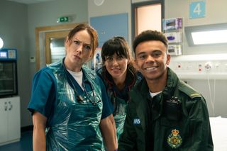 Kirsty behind the scenes with Elinor and Milo Clarke, who plays paramedic Teddy Gowan.