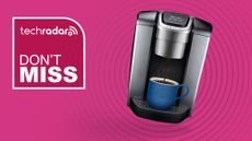 Keurig coffee maker on pink background with white text reading "TechRadar don't miss"