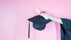 Paxton Smith, valedictorian abortion speech A hand holding graduation cap and diploma on pink background