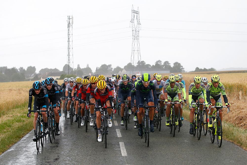 The peloton during stage 5 of the Tour de France in the rain