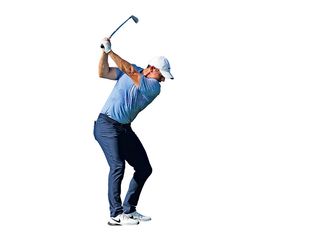 Rory McIlroy at the top of his backswing with an iron