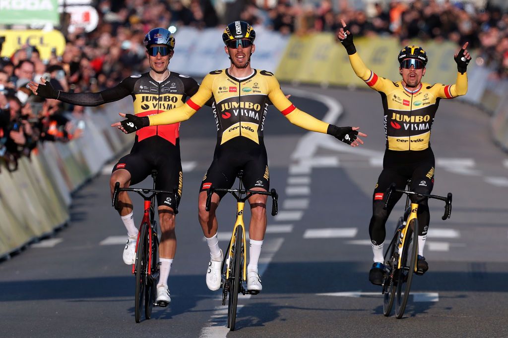 MANTESLAVILLE FRANCE MARCH 06 LR Wout Van Aert of Belgium Christophe Laporte of France stage winner and Primoz Roglic of Slovenia and Team Jumbo Visma celebrate crossing the finish line during the 80th Paris Nice 2022 Stage 1 a 160km stage from ManteslaVille to ManteslaVille ParisNice WorldTour on March 06 2022 in ManteslaVille France Photo by Bas CzerwinskiGetty Images