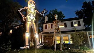 Lowe's 20-foot inflatable skeleton vs Home Depot 12-foot Skelly