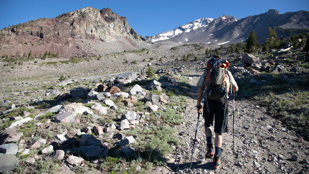 Nick Meyers, lead climbing ranger at Shasta-Trinity National Forest leads reporters up Mount Shasta