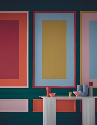 A living room with a color block panel