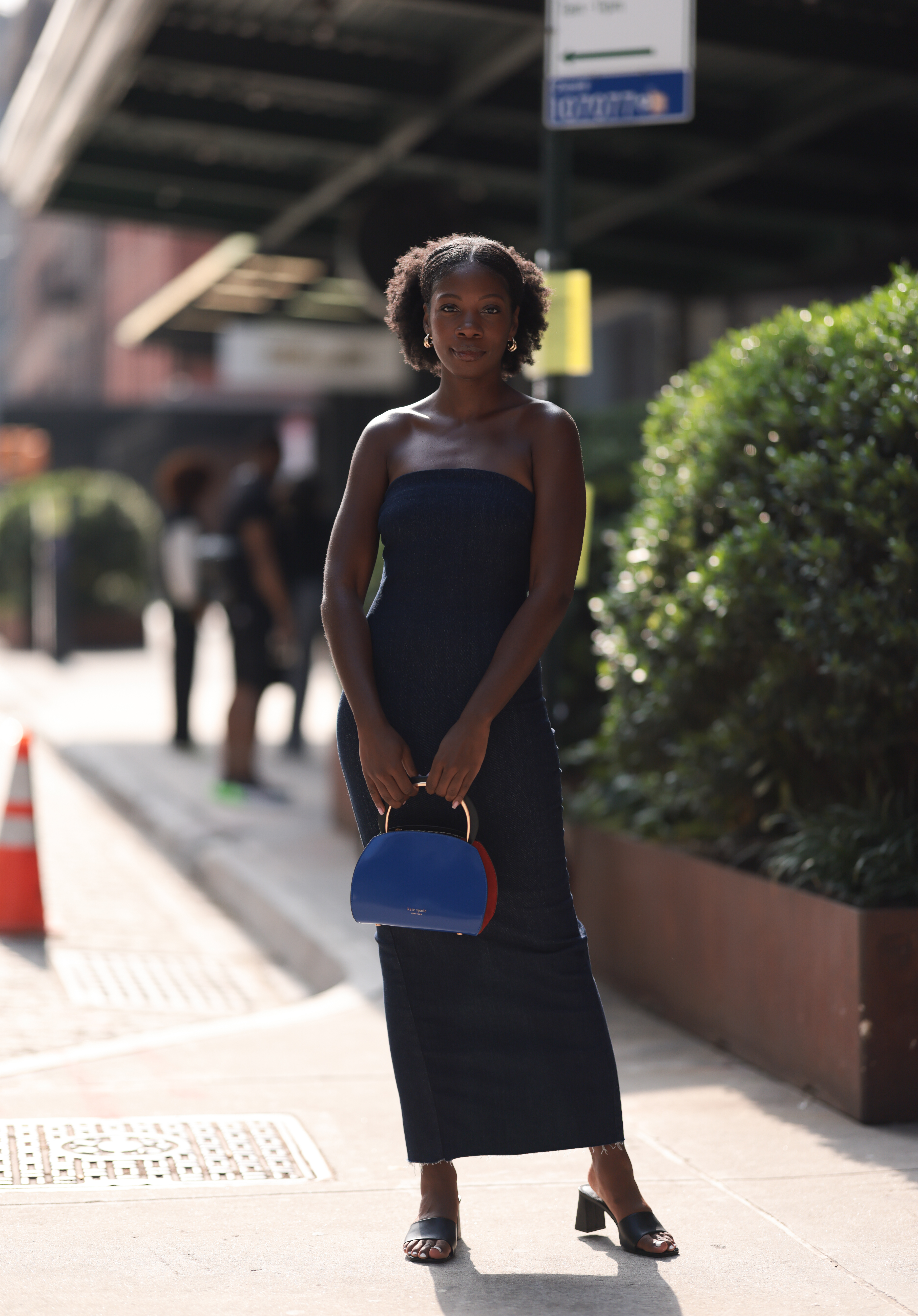 woman wearing a black sleeveless dress
