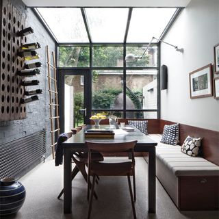 dining room with graphite coloured paint wall and dining table