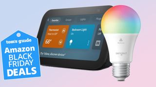 An Echo Show 5 (3rd Gen) with a Sengled smart bulb with a Tom's Guide deals badge