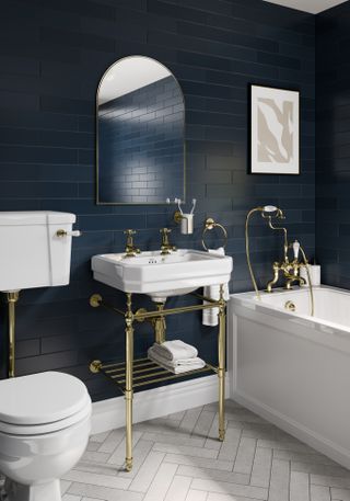 dark blue wall tiles in small bathroom