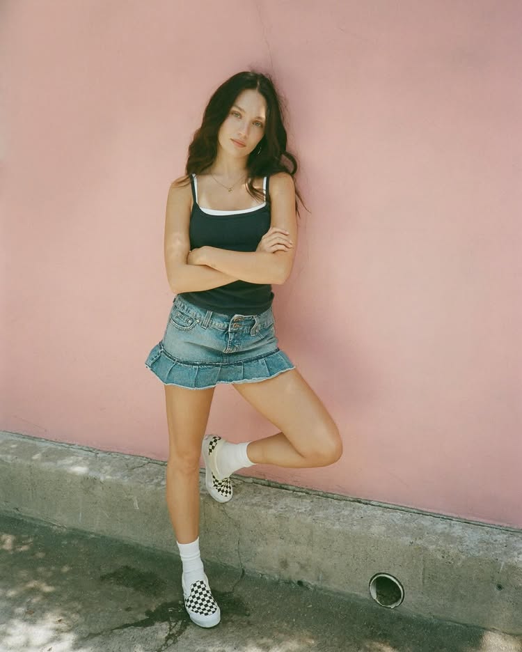 An image of @maddieziegler wearing slip-on trainers, one of the biggest summer trainer trends of 2026.