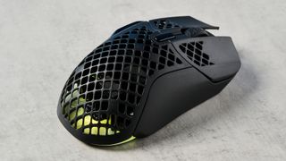 Photograph of the SteelSeries Aerox 5 wireless gaming mouse with honeycomb design