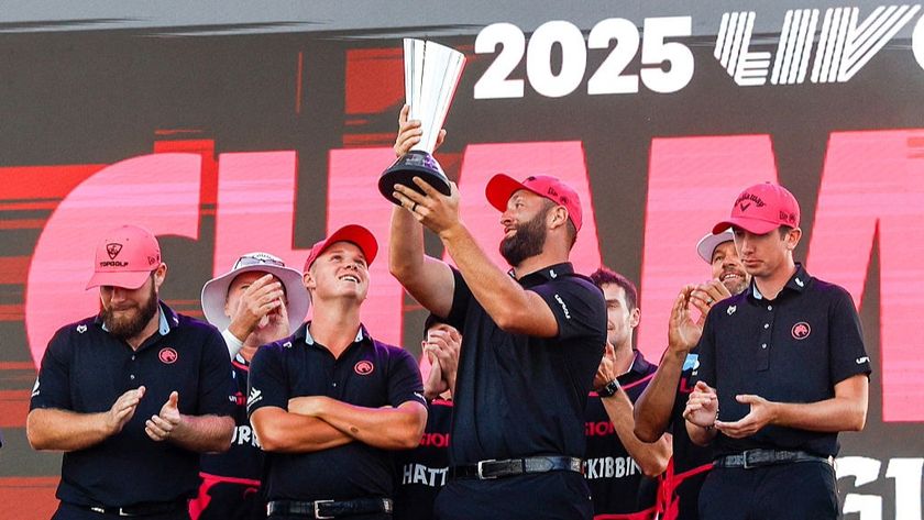 Jon Rahm, surrounded by his teammates, raises the Team Championship trophy after his Legion XIII side won the LIV Golf 2025 title.