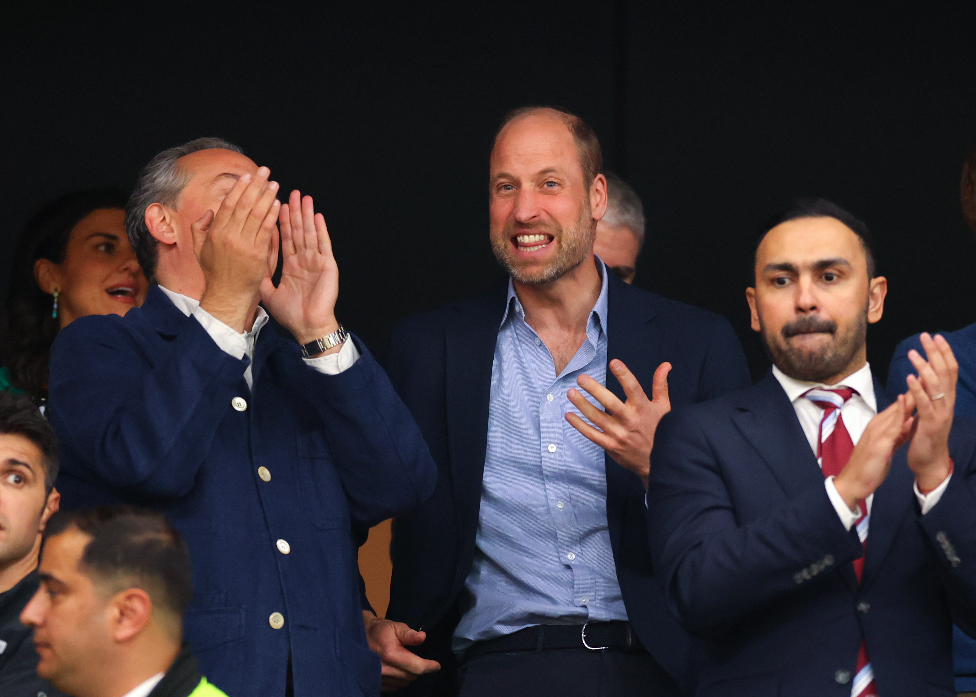 Prince William cheering at an Aston Villa match