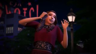 The Sims 4 Lovestruck gameplay trailer screenshot showing a young woman with long brown hair wearing a dark red dress with black lace outlines ont he phone, smiling