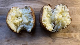 jacket potato with butter on a table