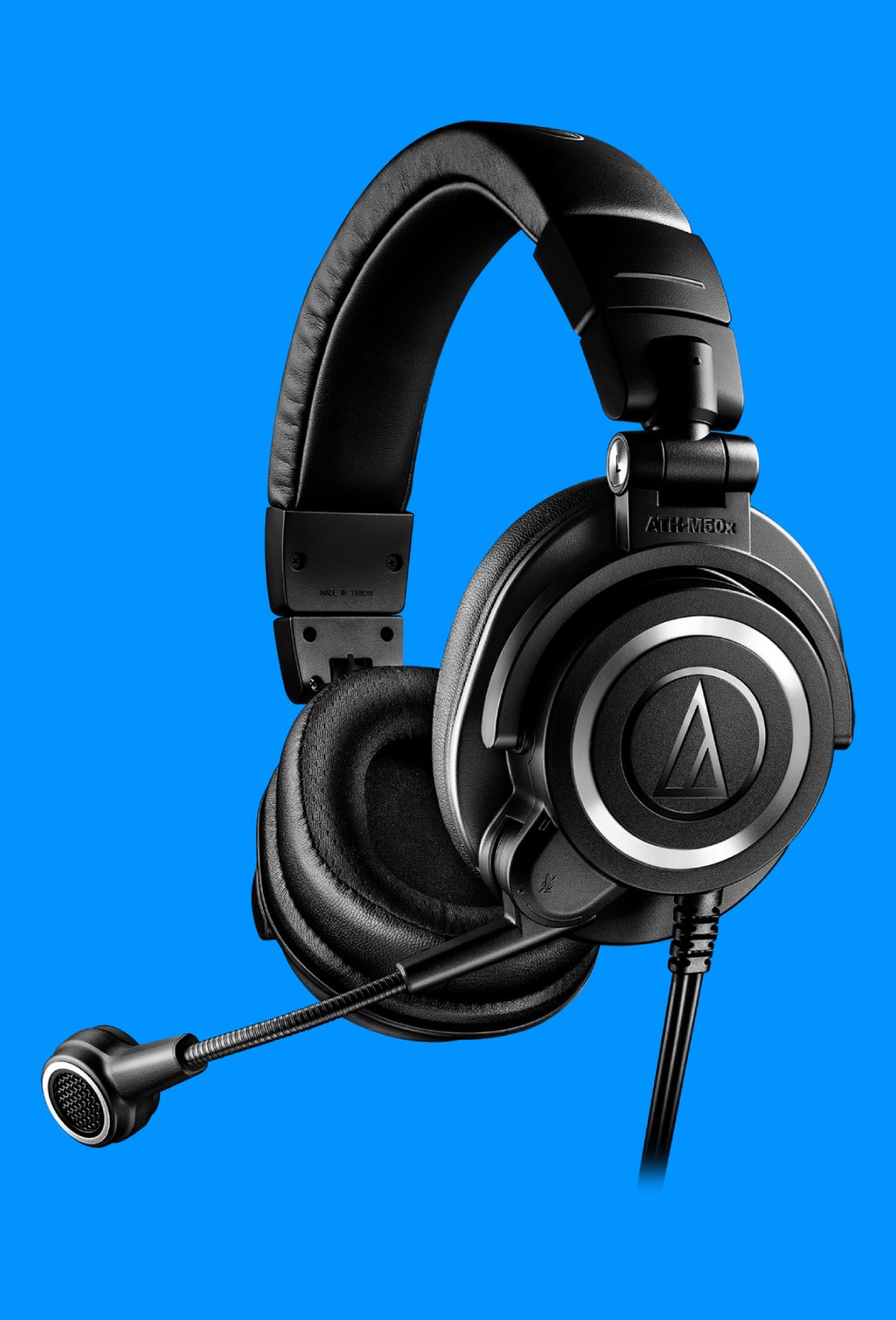 The Audio-Technica ATH-M50xSTS StreamSet on a blue background