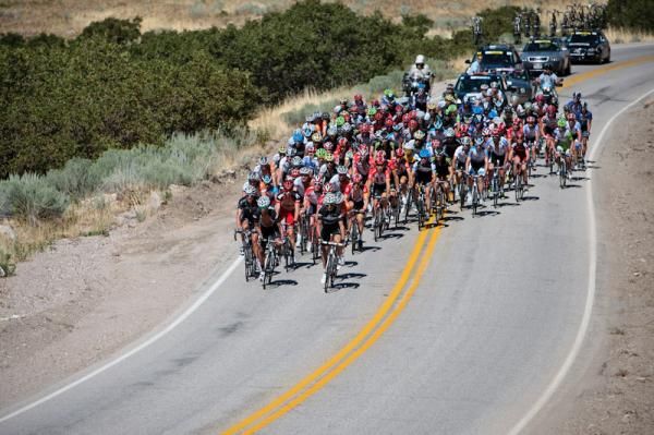 The field hits the base of the climb.