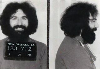 A mug shot of Grateful Dead guitarist Jerry Garcia (1942 - 1995), following his arrest in New Orleans, 31st January 1970