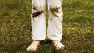 Trousers with grass stains on