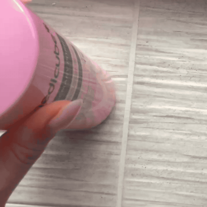 Gif pumping Medicube's Rosemary PDRN Shampoo onto the palm of the hand