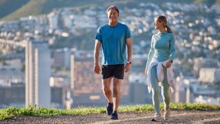 a woman and man walking together