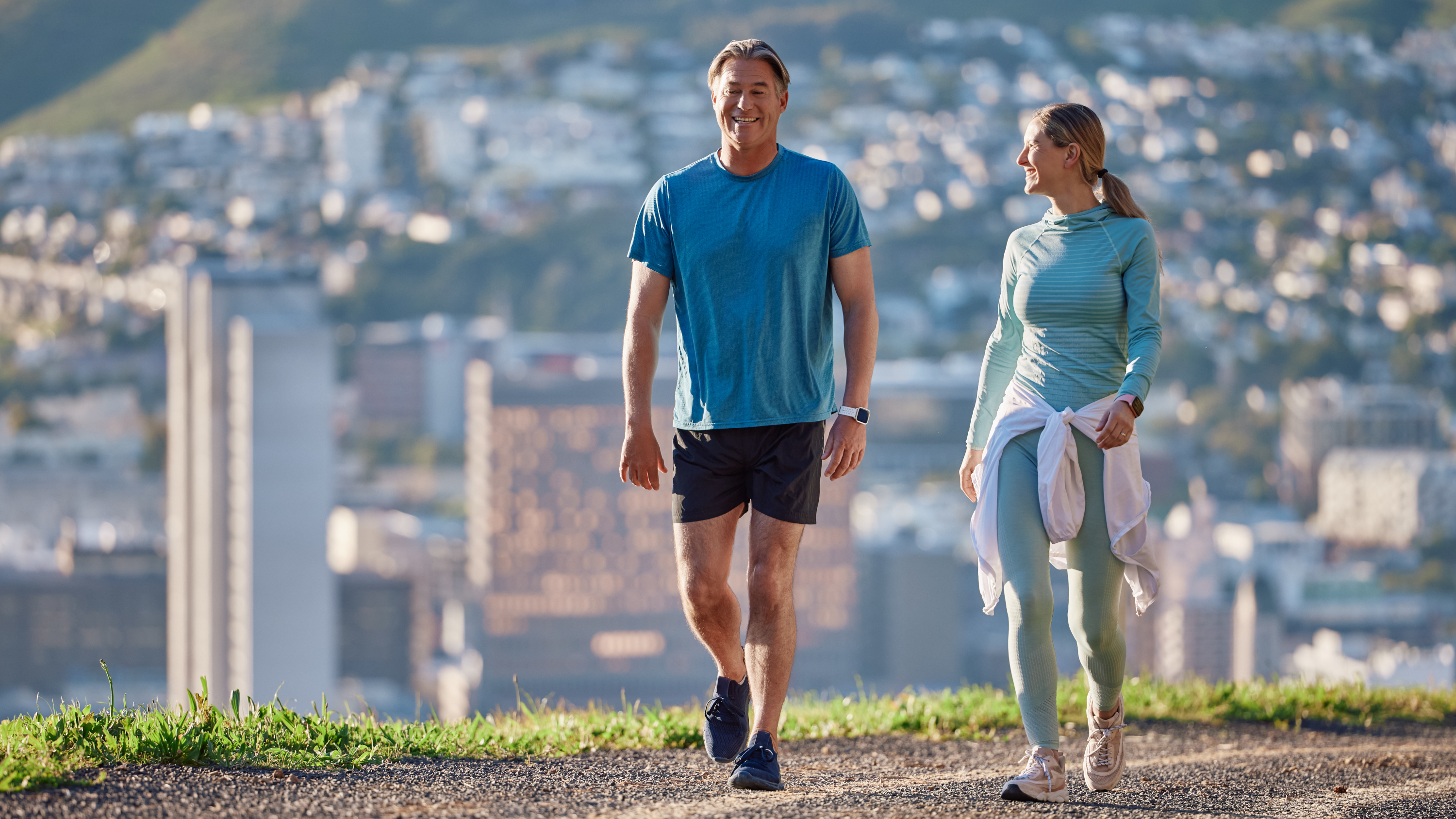 a woman and man walking together
