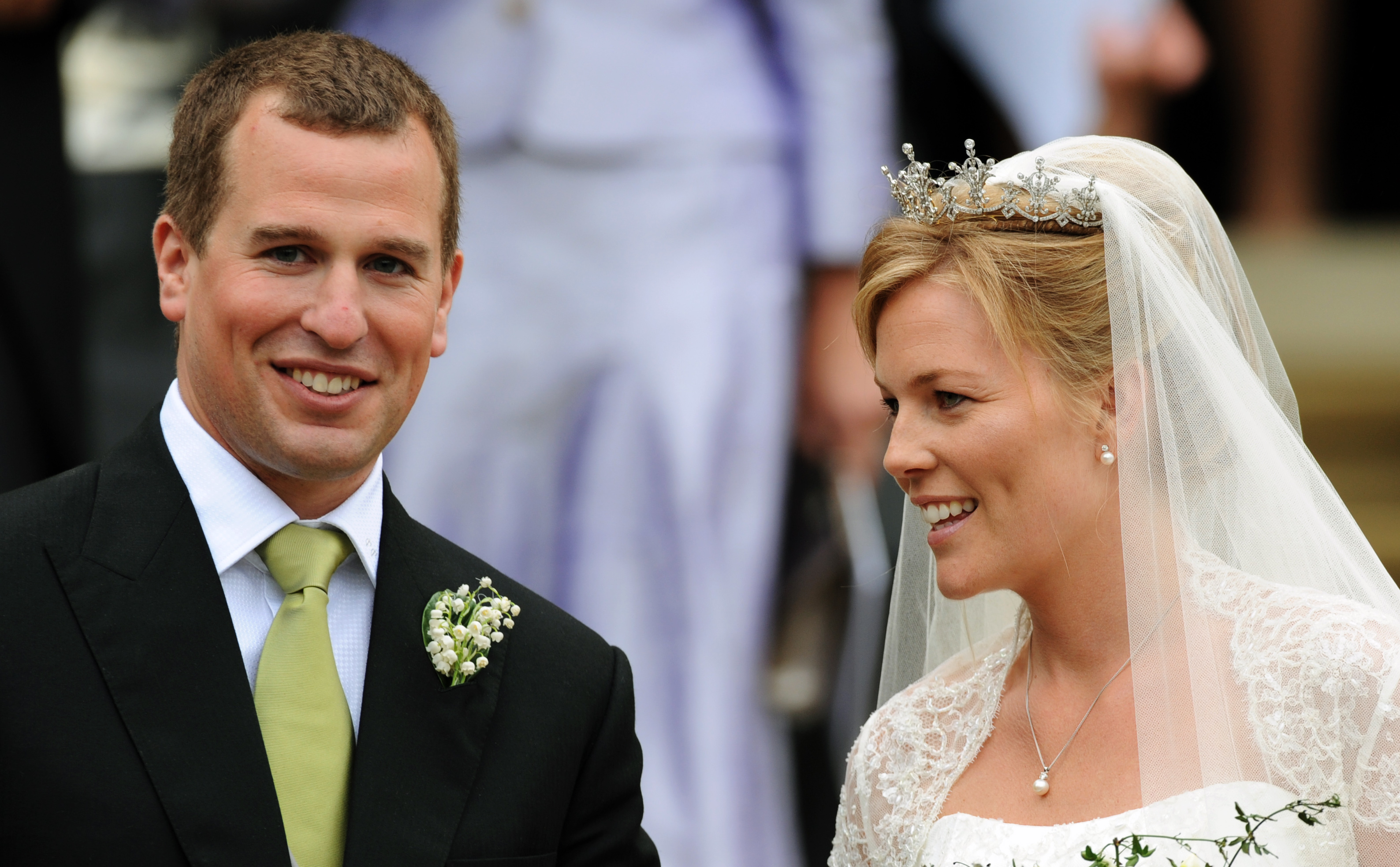 Peter Phillips and Autumn Kelly on their wedding day smiling