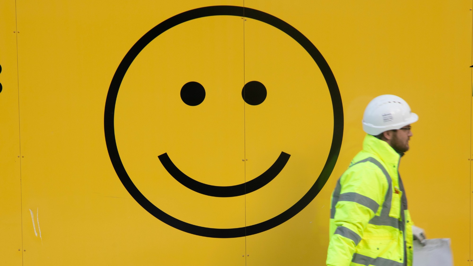 Worker and a smiley face
