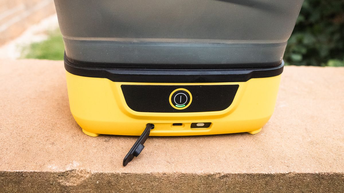 Details of the K&auml;rcher OC3 Foldable Cleaner showing the power button and charging port