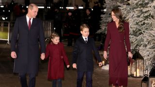 Prince William, Prince of Wales, Princess Charlotte of Wales and Prince George of Wales and Catherine, Princess of Wales attend the 'Together at Christmas' Carol Service at Westminster Abbey