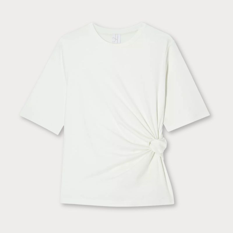 A cutout of a white t-shirt with a knot in it by John Lewis